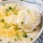 smoked gouda grits in a bowl with butter and cheese