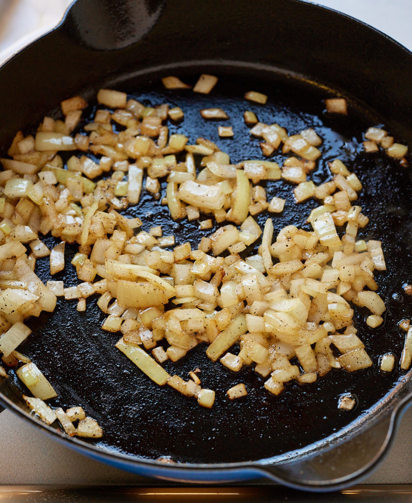 onions satuee in a skillet