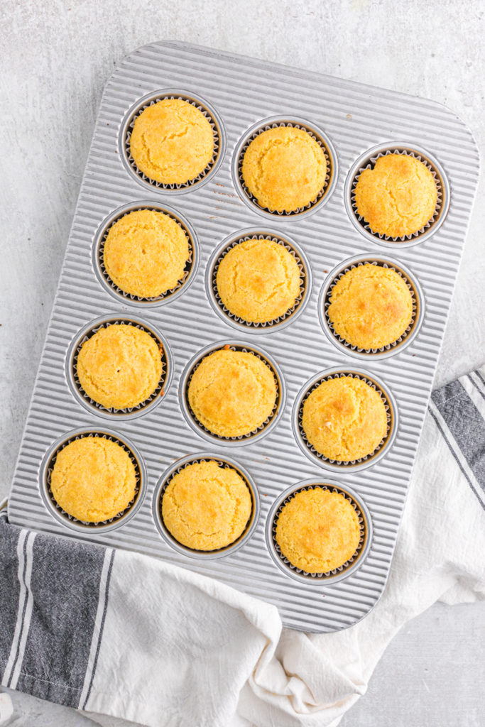 Jiffy Corn muffins in a muffin pan after baking