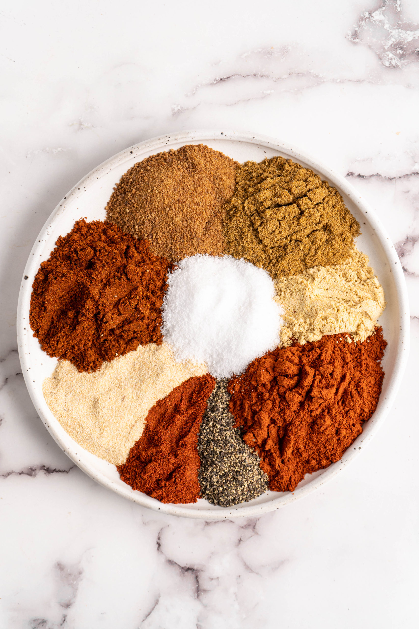 BBQ spice rub ingredients on plate