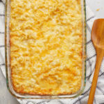 baked mac and cheese in a glass bakeware container