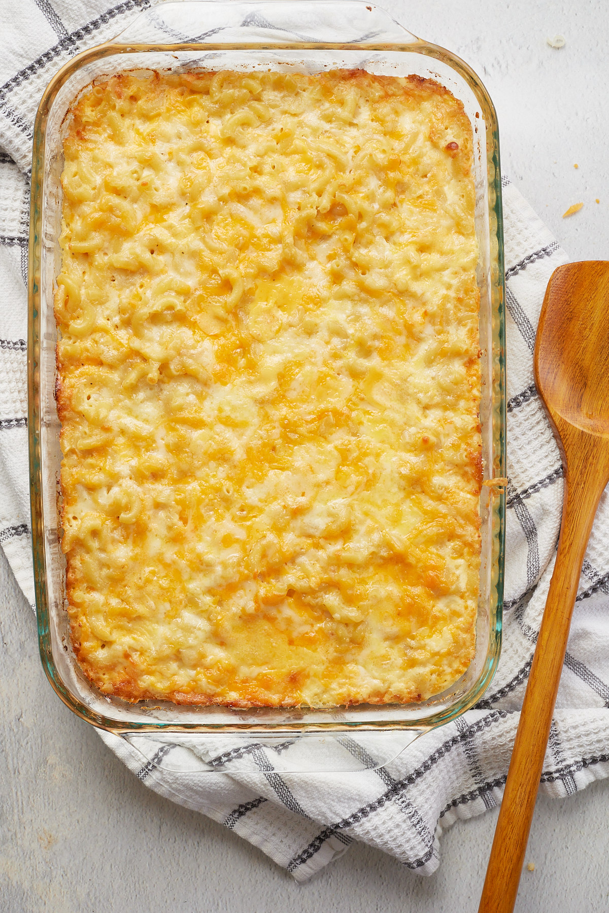 baked mac and cheese in a glass bakeware container