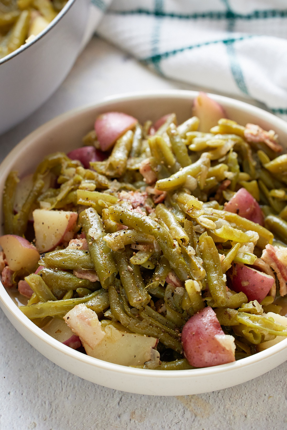 green beans and potatoes in white plate