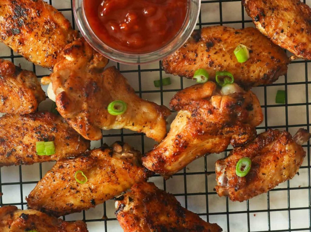 grilled chicken on a cooling rack