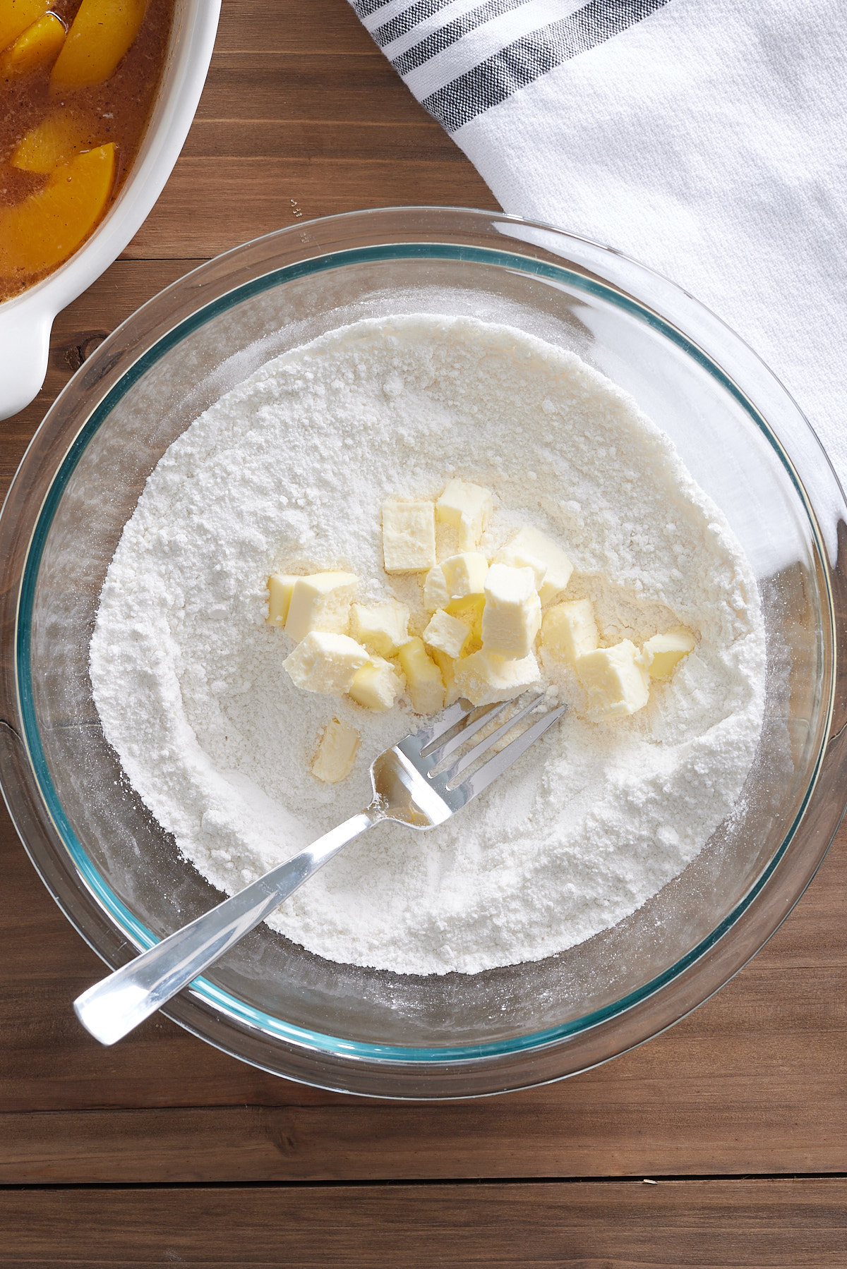 flour mixture with cold butter cubes on top