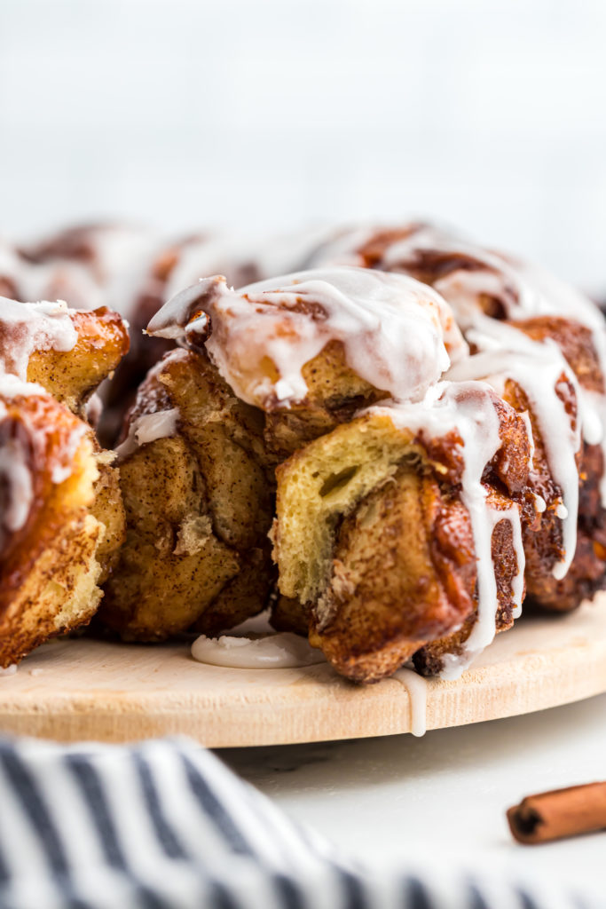 A close up of cinnamon roll monkey bread with pieces missing