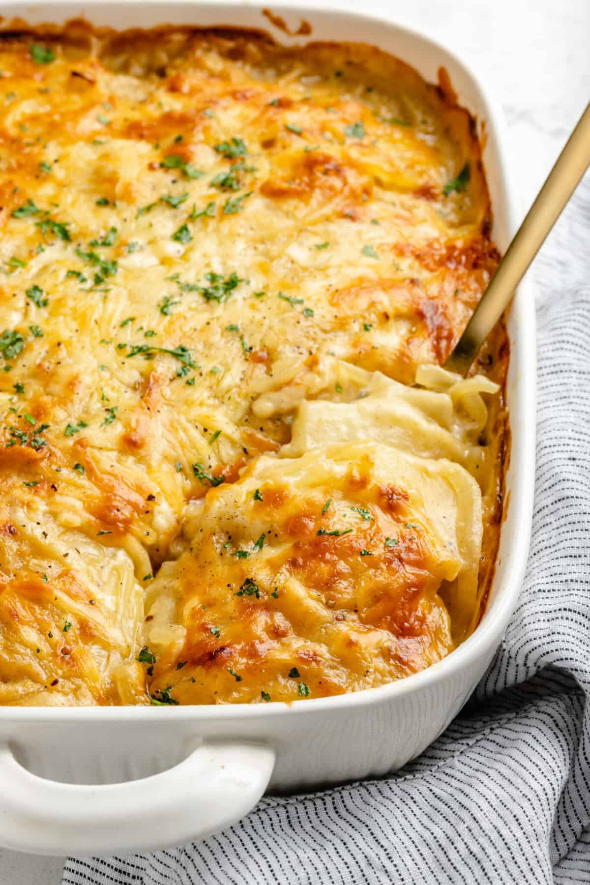 Vegan scalloped potatoes in casserole dish