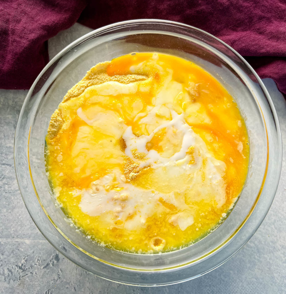 homemade cornbread mix in a glass bowl