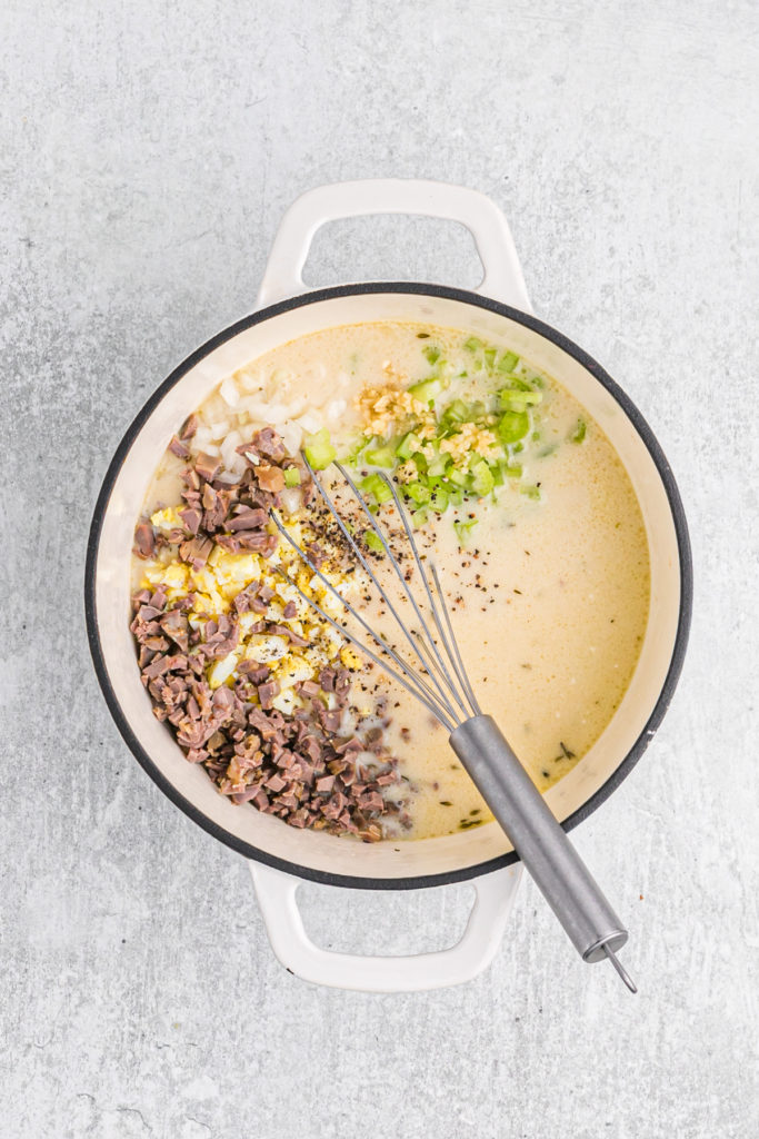 Giblets being added to a gravy mixture