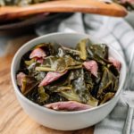 Collard Greens with Smoked Turkey in a white bowl