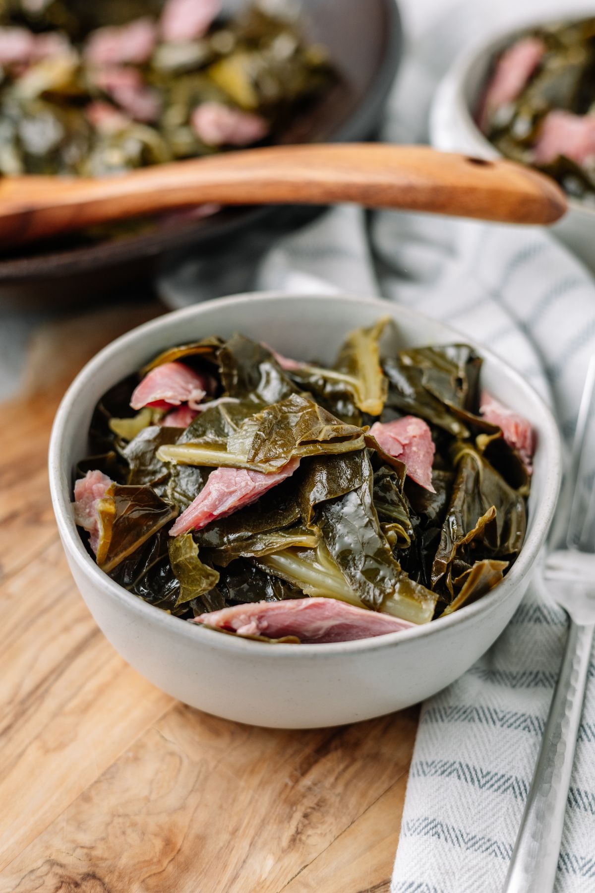 Collard Greens with Smoked Turkey on a white bowl