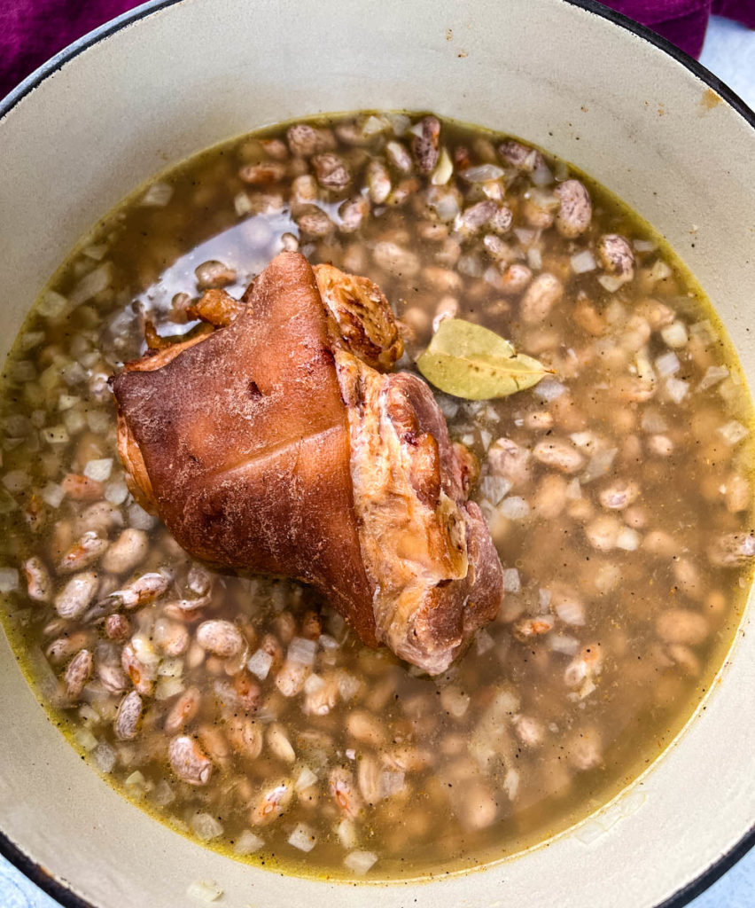 pinto beans and ham hocks in a pot