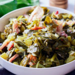 southern style collard greens in white bowl