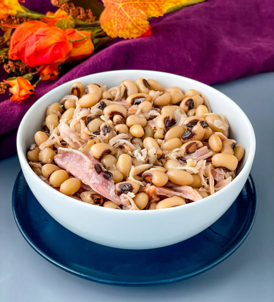 Southern black eyed peas with smoked turkey in a white bowl