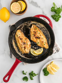 Blackened catfish in a skillet