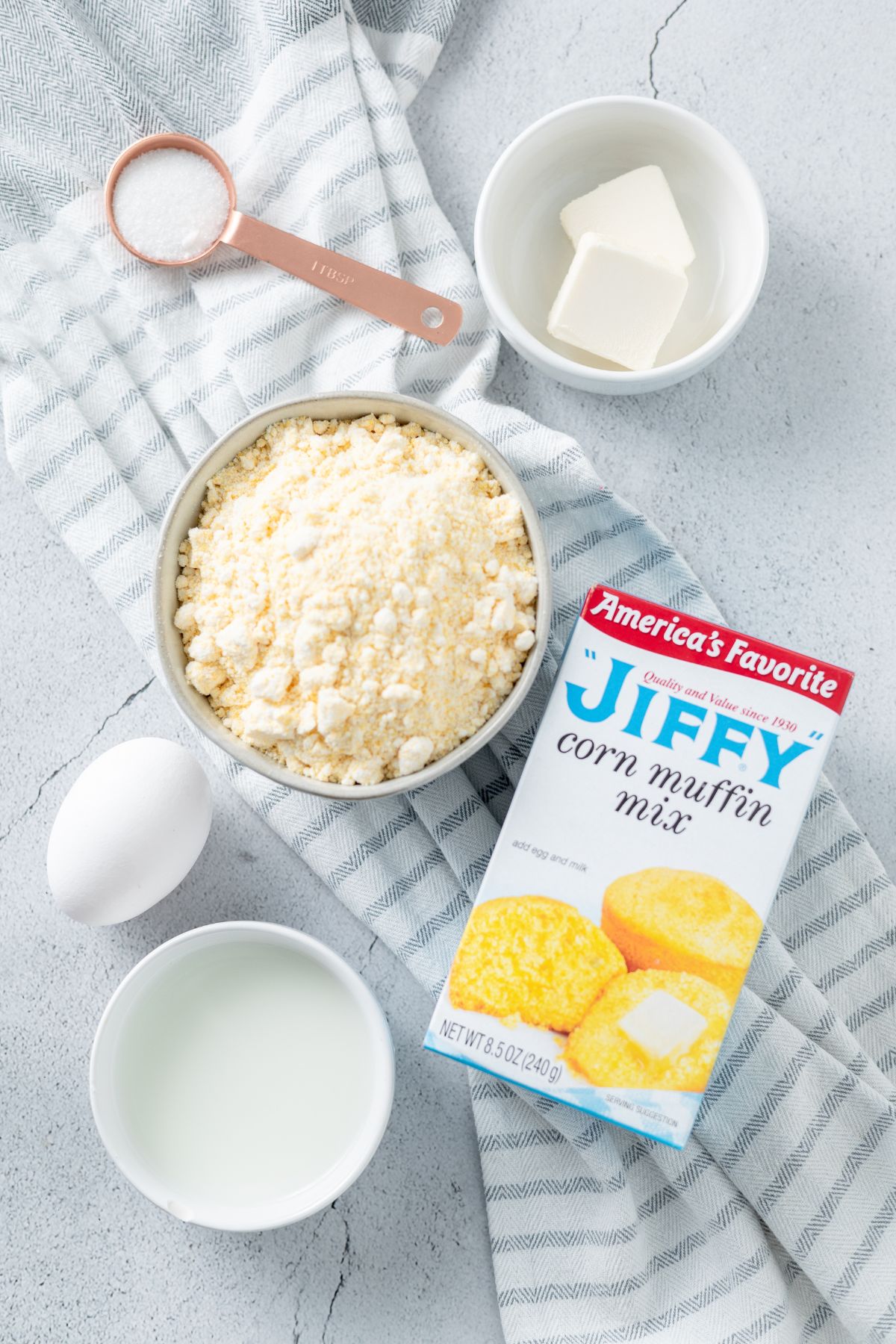Jiffy corn muffin mix. sugar, Large egg, Milk, melted Butter, Oil spray on separate bowls
