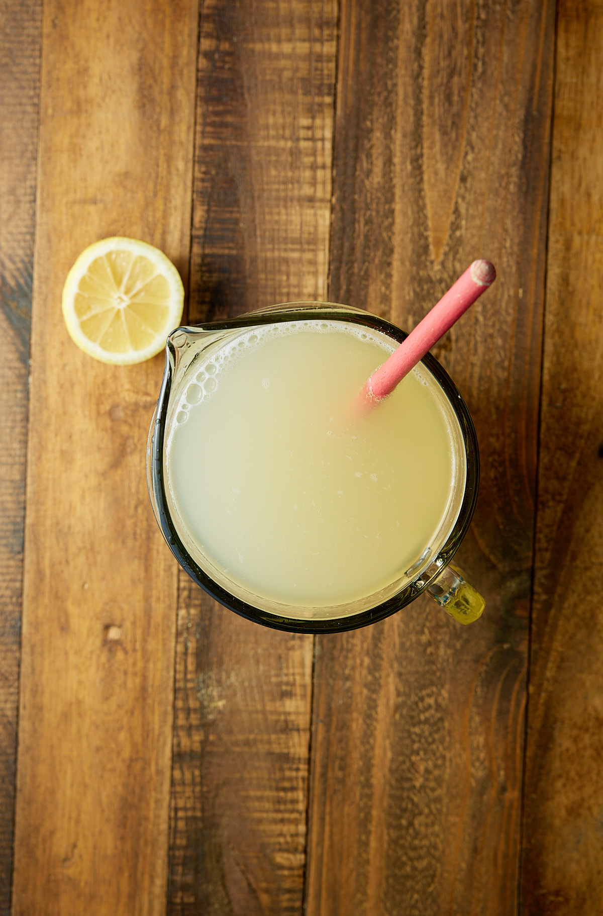 lemonade mixed in pitcher