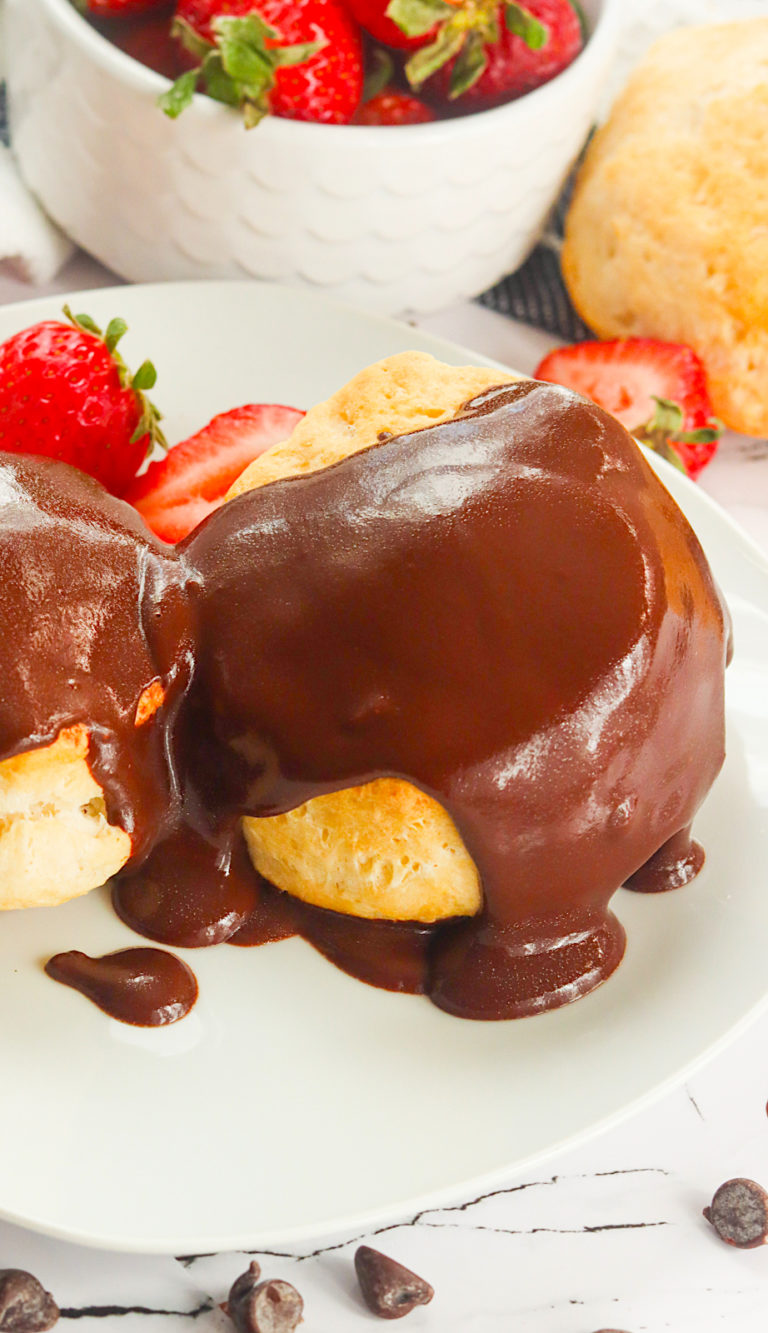 Freshly made chocolate gravy and biscuits with strawberries