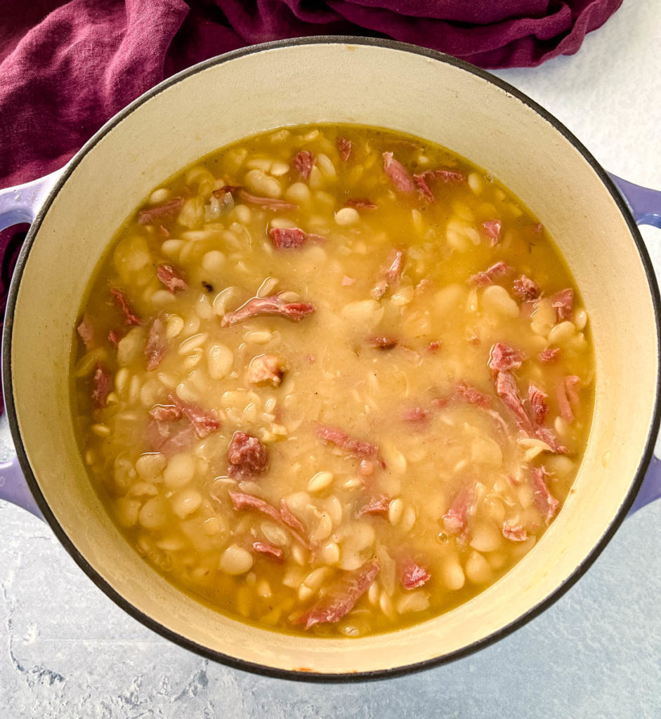 lima beans and smoked turkey in a large pot