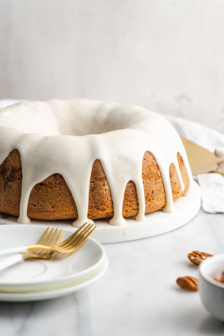 Iced vegan Sock It to Me Cake on platter