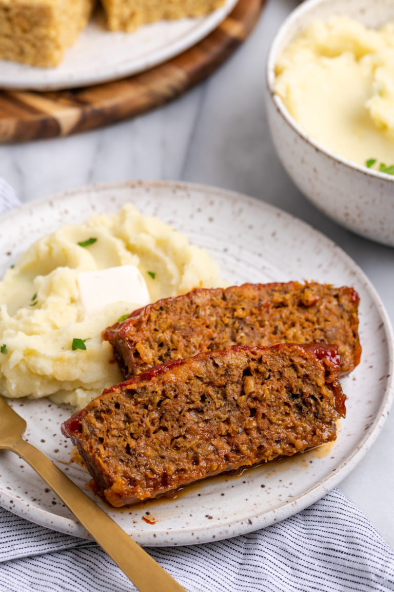 Vegan Southern meatloaf on plate with mashed potatoes