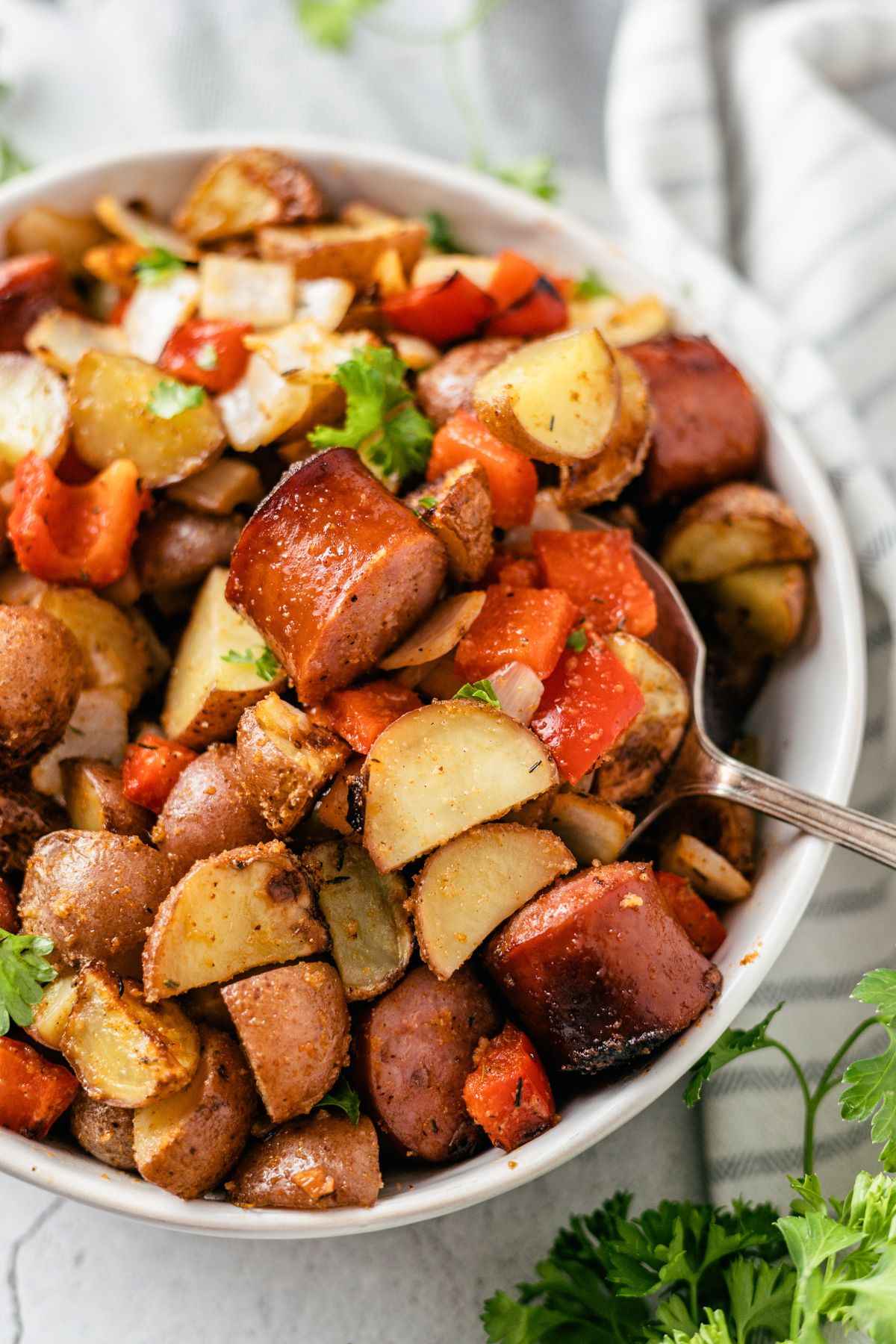 Air Fryer Sausage & Potatoes in a large serving bowl