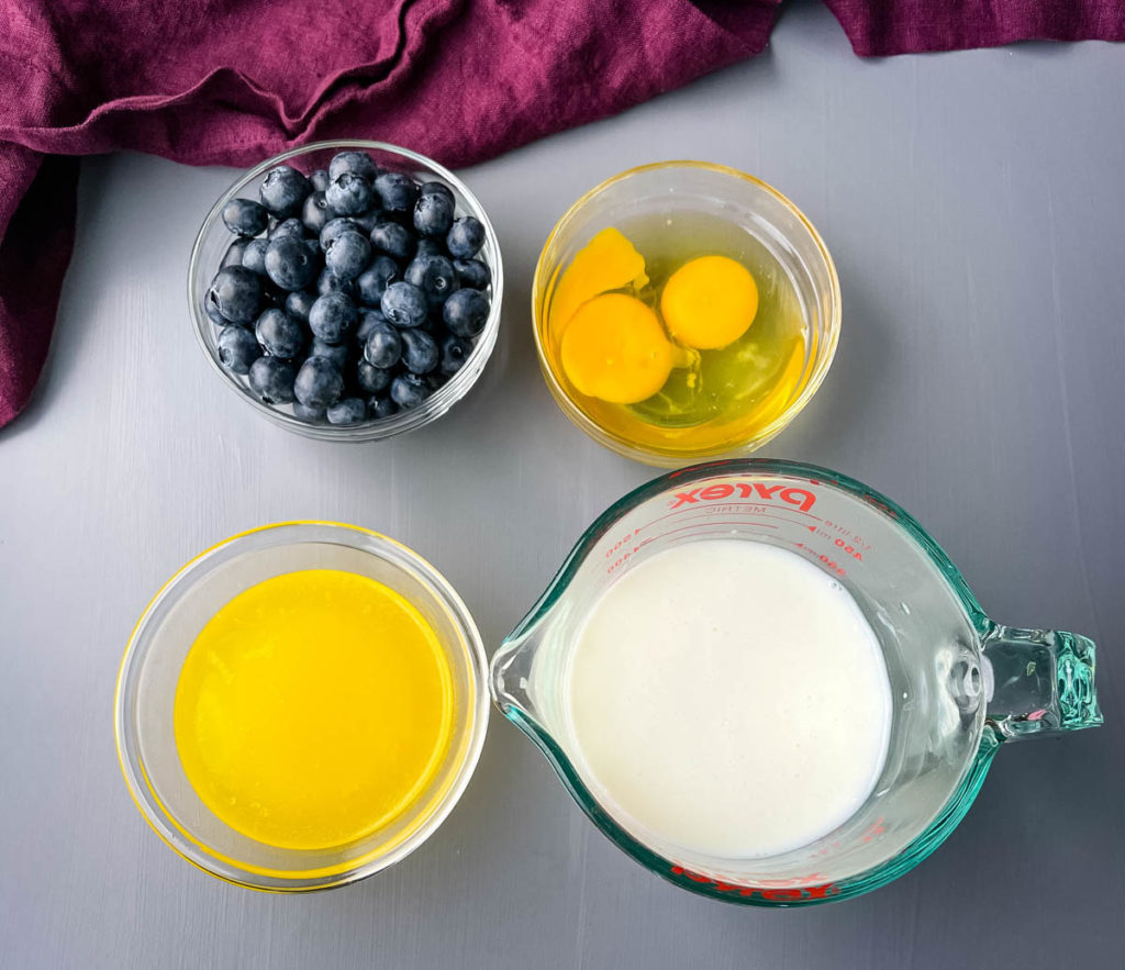 fresh blueberries, eggs, melted butter, and buttermilk in separate bowls