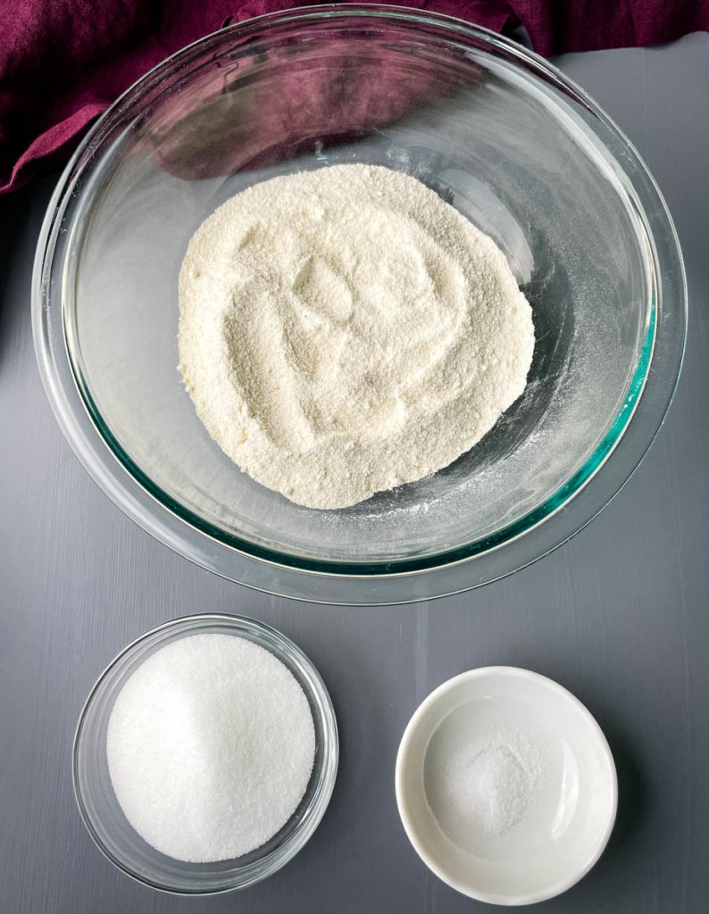 cornmeal, sugar, and baking powder in separate bowls