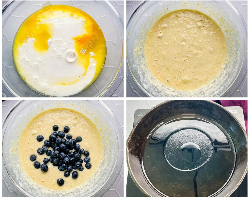 cornbread batter in a glass bowl with blueberries