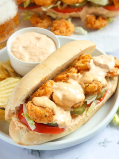 Serving up a soul-satisfying shrimp po boy sandwich with a side of spicy remoulade
