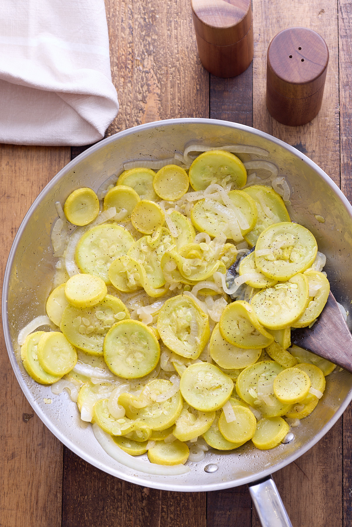 sauteed yellow squash in skillet
