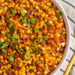 Overhead view of vegan corn maque choux in serving bowl