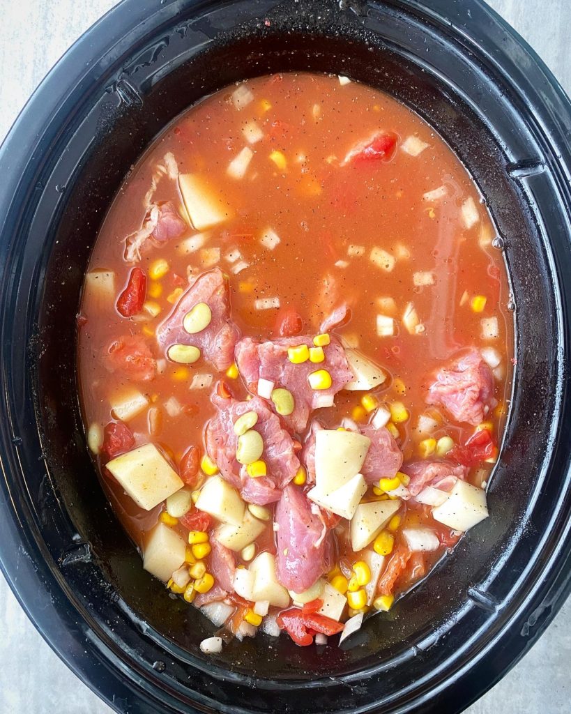 overhead shot of uncooked crockpot Brunswick stew