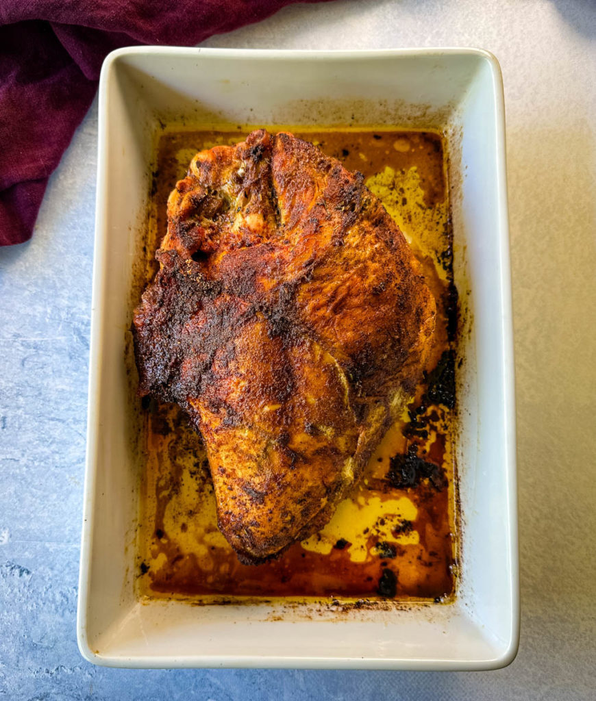 cooked, baked, roasted turkey breast in a pan