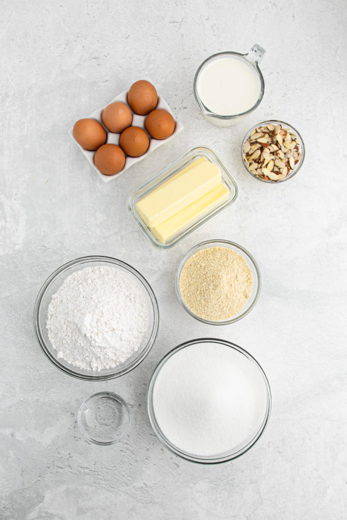 Ingredients to make a cold oven pound cake with almond flavor