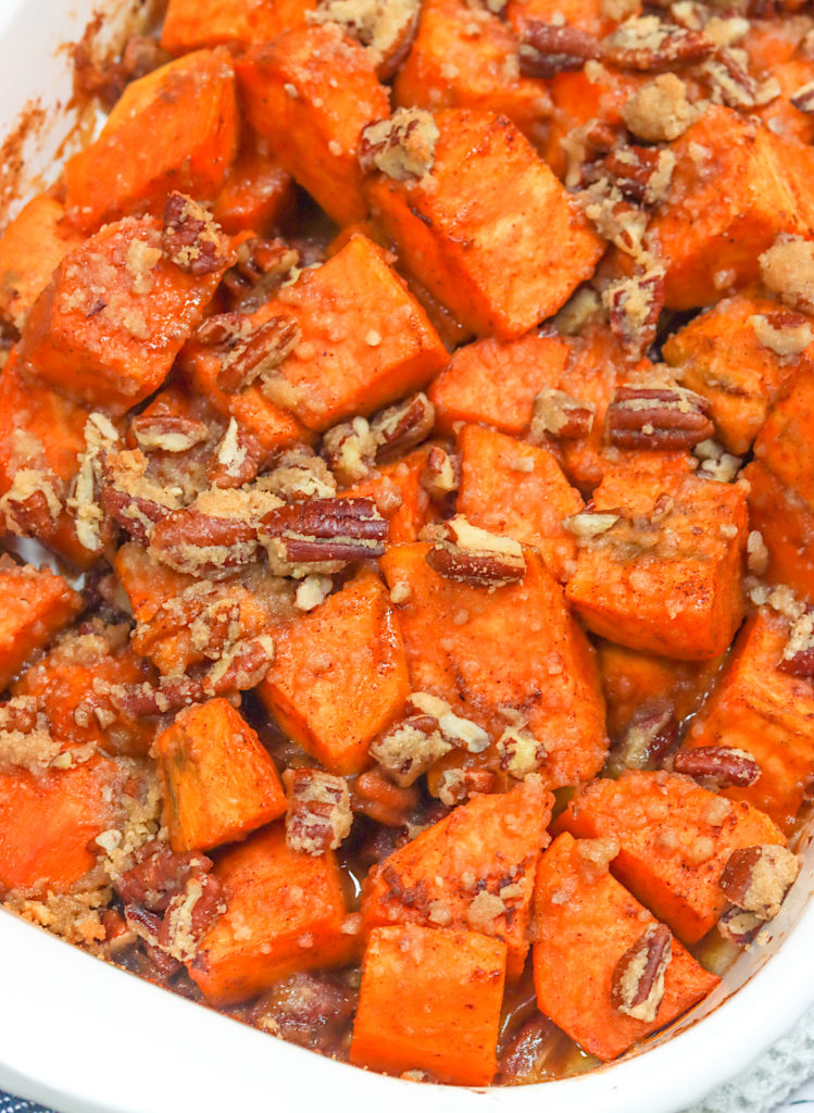 Yam casserole topped with chopped pecans