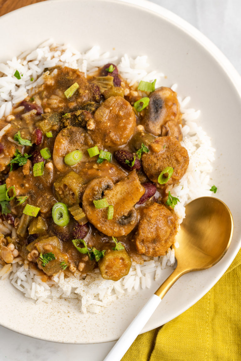 Overhead view of white rice and vegan gumbo in bowl
