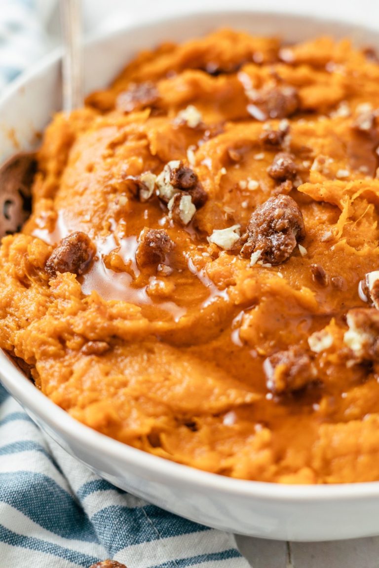 close-up shot of Whipped Sweet Potatoes topped with nutmegs on a large bowl