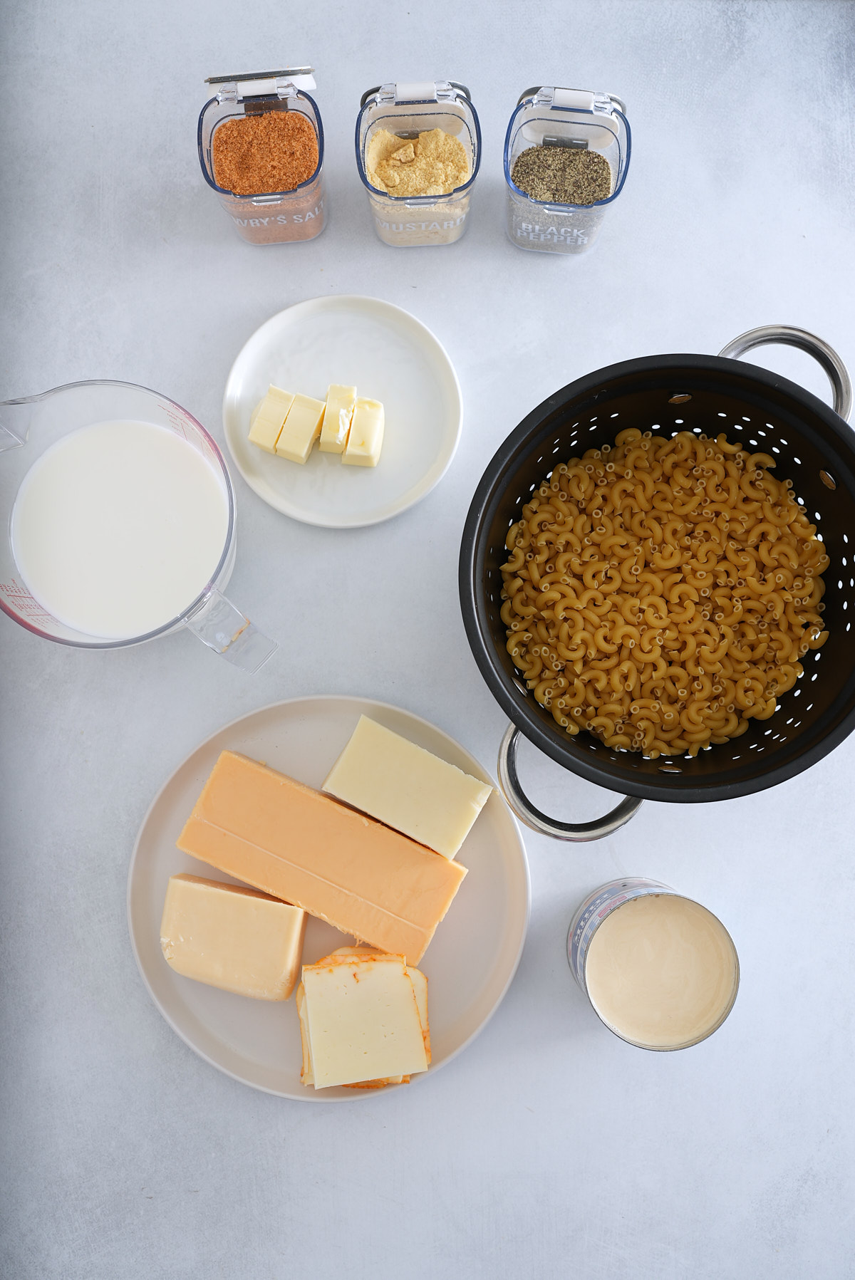 ingredients for slow cooker mac and cheese on table
