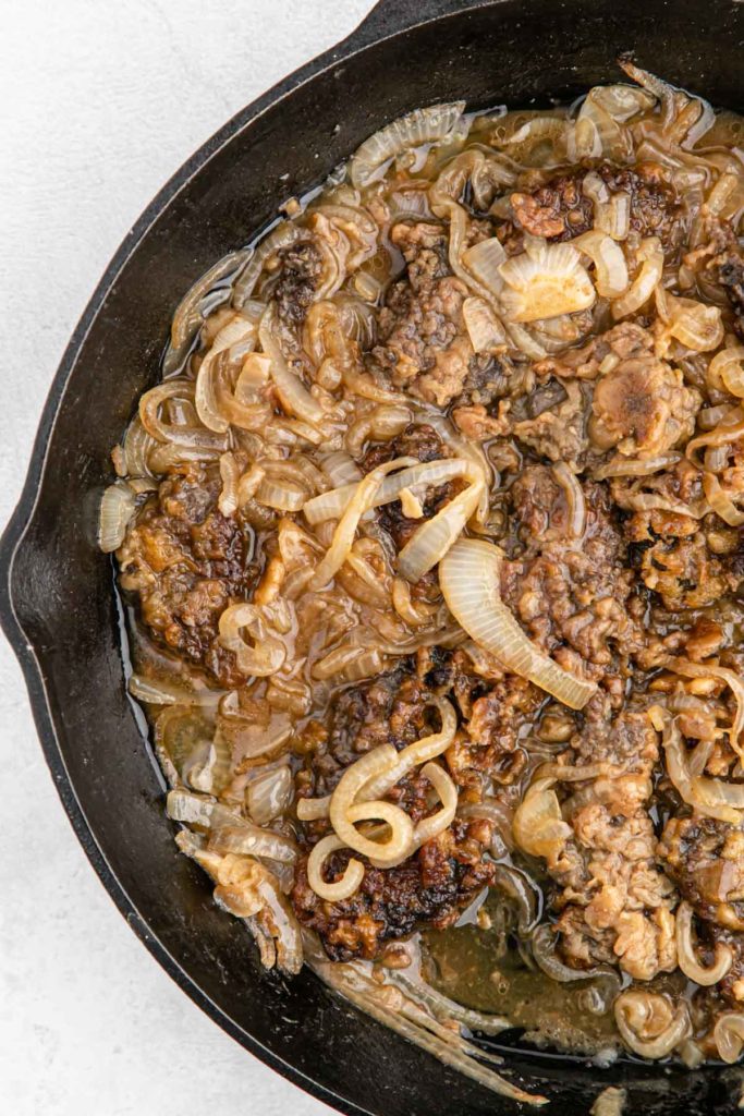 A close up of liver and onions recipe ready to enjoy