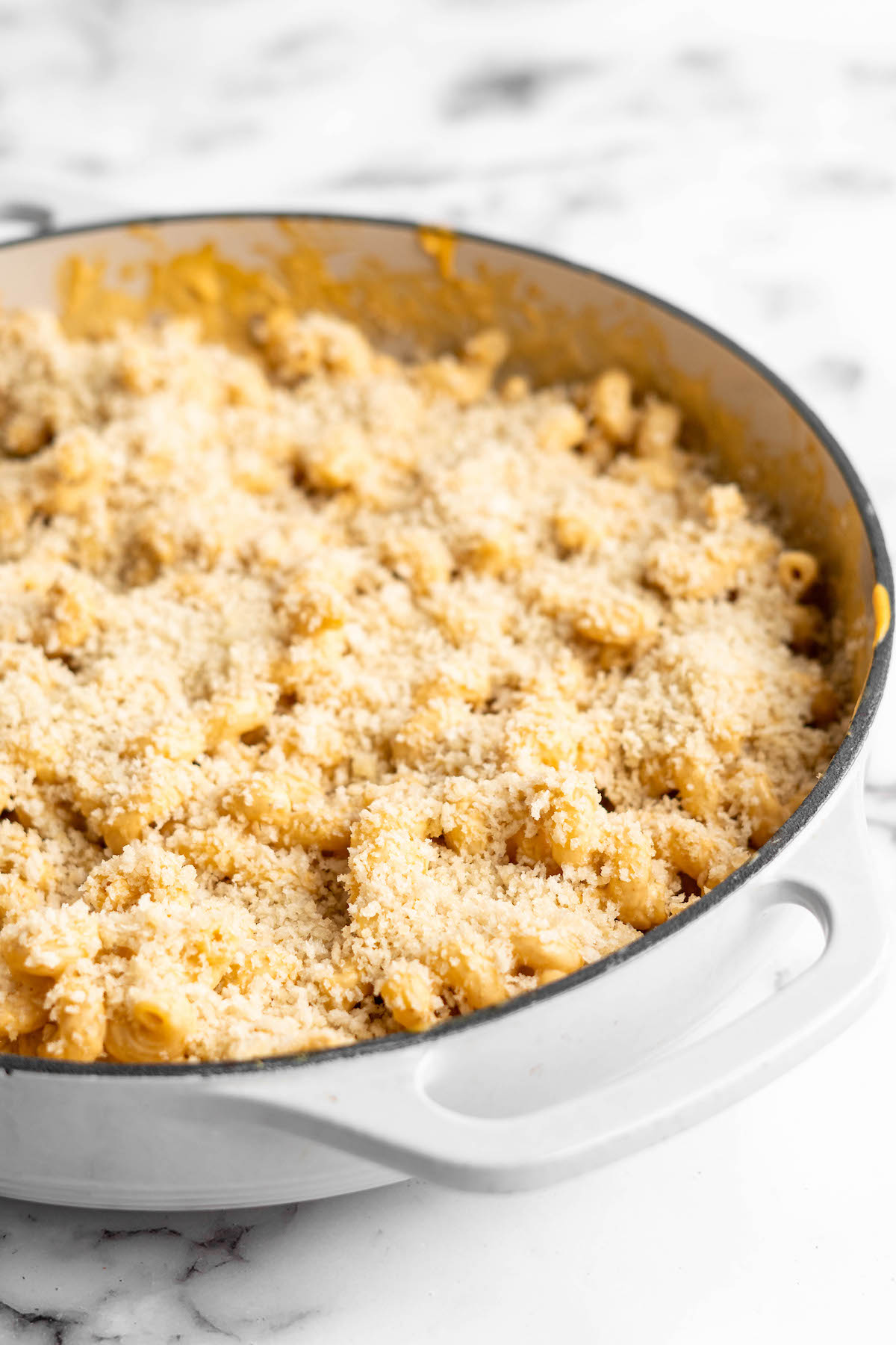 Vegan mac and cheese in skillet before baking