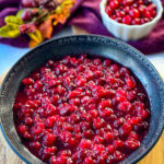 homemade cranberry sauce in a black bowl