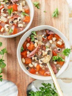 A delightful serving of Black-eyed Peas in two bowls, a scrumptious meal.