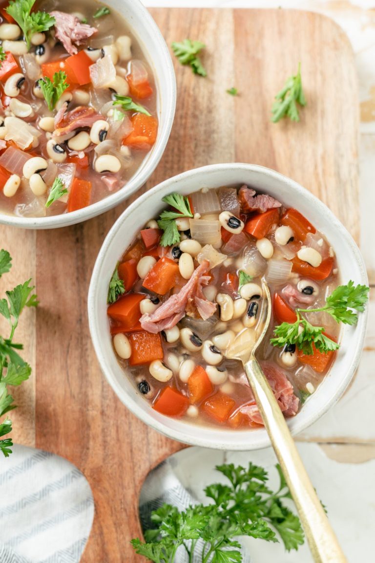 A delightful serving of Black-eyed Peas in two bowls, a scrumptious meal.