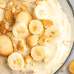 Overhead view of creamy vegan banana pudding in trifle dish