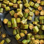roasted okra with spatula picking it up