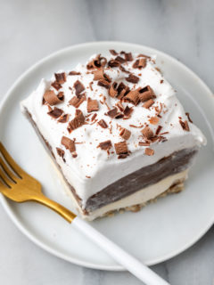Creamy chocolate delight on plate with fork