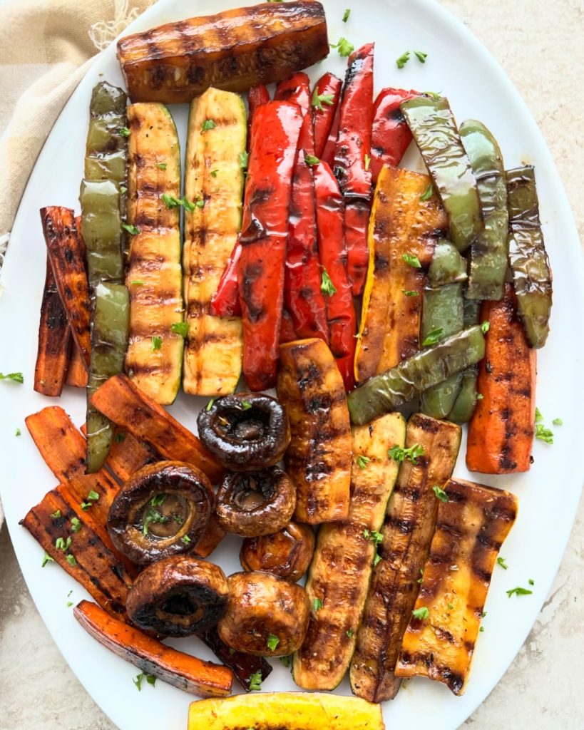 overhead shot of grilled vegetables on a white plate