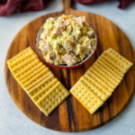 ham salad in a red bowl with crackers