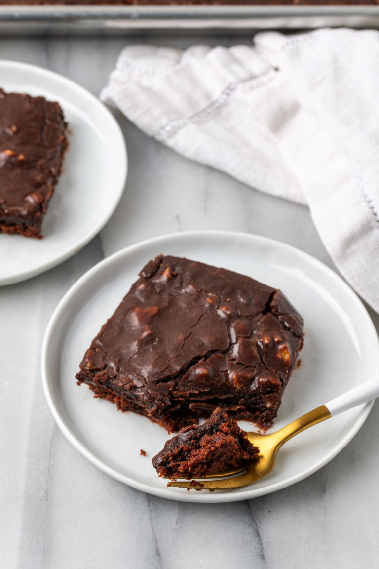 Overhead view of Texas sheet cake on plate with fork